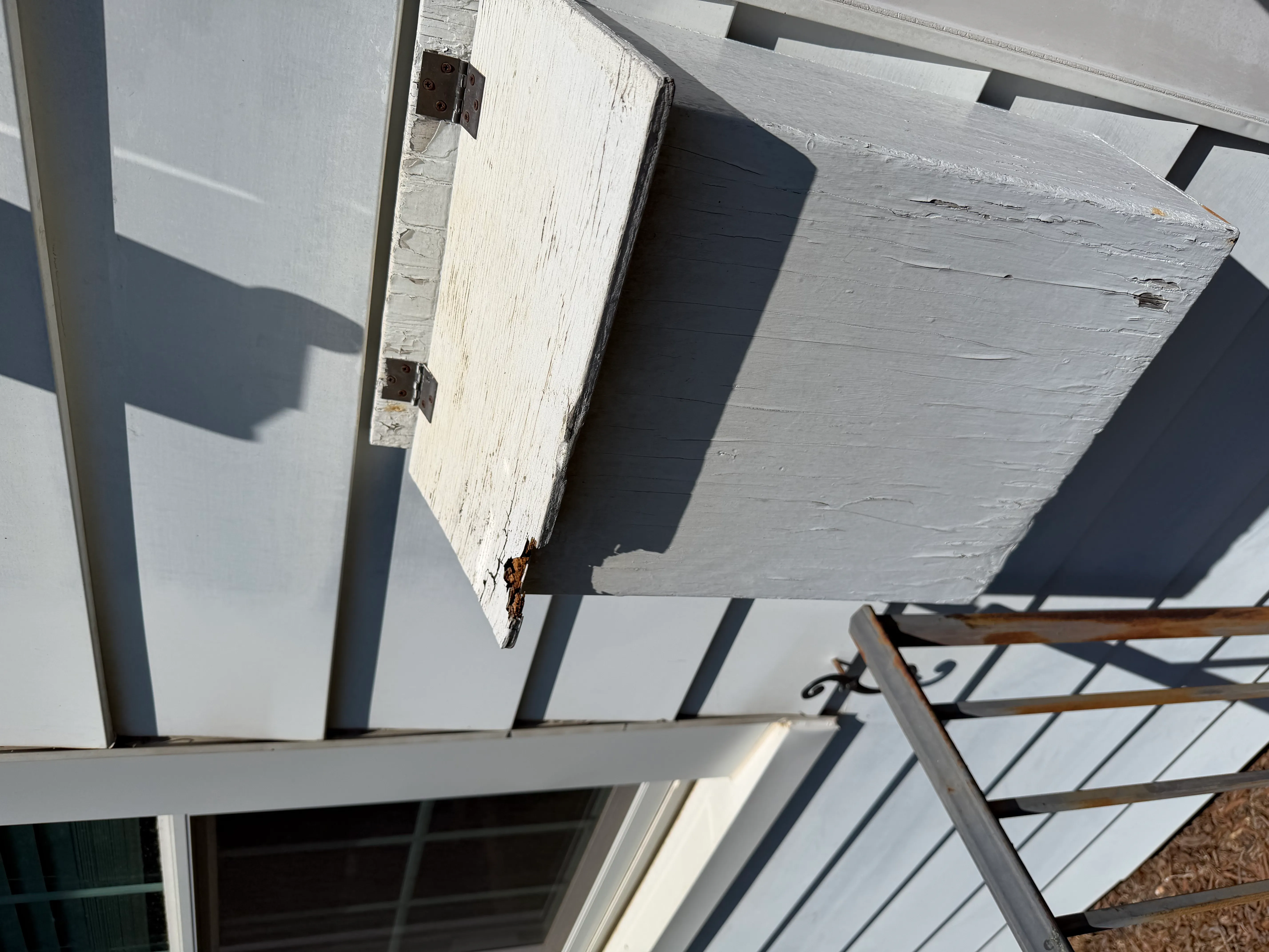 Before - weathered exterior shelf with peeling paint